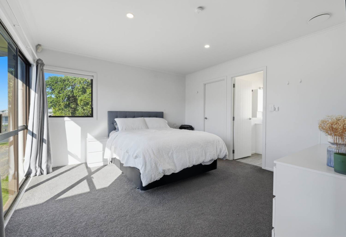 746m2 section, 4 beds (1 ensuite) + study room 2 baths house with garage, Downstairs offers internal access garaging plus a versatile rumpus room, move-in ready, close to schools, shops, supermarkets, 0.2 km to Riverhills School, 127 Ennis Avenue, Pakuranga Heights, Auckland