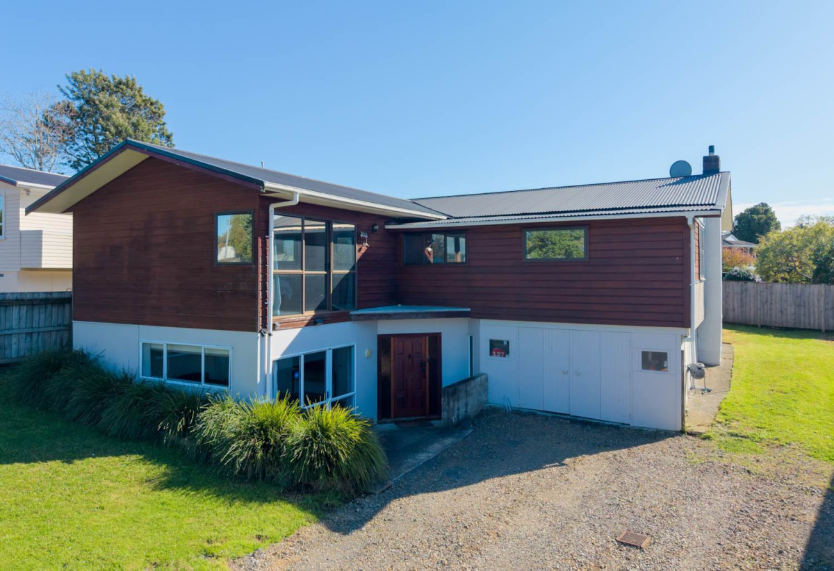 746m2 section, 4 beds (1 ensuite) + study room 2 baths house with garage, Downstairs offers internal access garaging plus a versatile rumpus room, move-in ready, close to schools, shops, supermarkets, 0.2 km to Riverhills School, 127 Ennis Avenue, Pakuranga Heights, Auckland