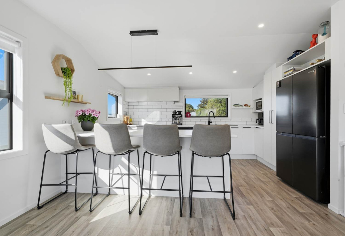 746m2 section, 4 beds (1 ensuite) + study room 2 baths house with garage, Downstairs offers internal access garaging plus a versatile rumpus room, move-in ready, close to schools, shops, supermarkets, 0.2 km to Riverhills School, 127 Ennis Avenue, Pakuranga Heights, Auckland