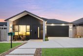 4 beds 3 baths house with double garage on 498m2 section, Set within the peaceful seaside community of Clarks Beach, enjoy weekends are filled with beach walks, golf days, boating adventures, and relaxed evenings spent with family and friends, 31 Korowhiti Road, Clarks Beach, Auckland