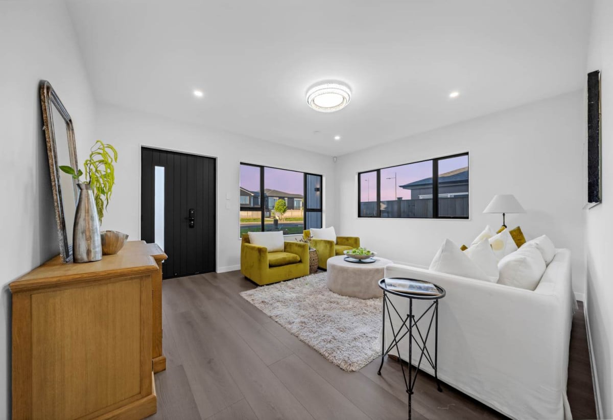 4 beds 3 baths house with double garage on 498m2 section, Set within the peaceful seaside community of Clarks Beach, enjoy weekends are filled with beach walks, golf days, boating adventures, and relaxed evenings spent with family and friends, 31 Korowhiti Road, Clarks Beach, Auckland