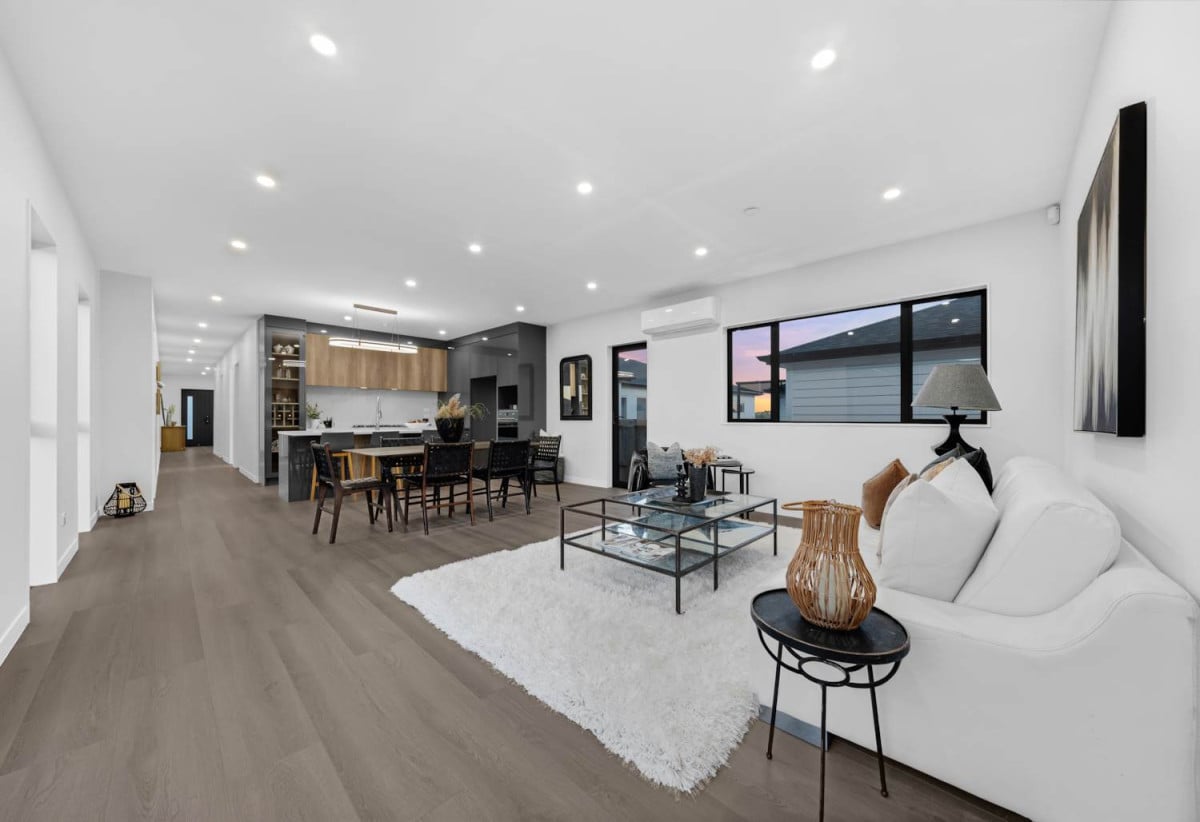 4 beds 3 baths house with double garage on 498m2 section, Set within the peaceful seaside community of Clarks Beach, enjoy weekends are filled with beach walks, golf days, boating adventures, and relaxed evenings spent with family and friends, 31 Korowhiti Road, Clarks Beach, Auckland
