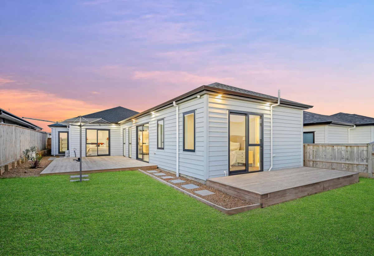 4 beds 3 baths house with double garage on 498m2 section, Set within the peaceful seaside community of Clarks Beach, enjoy weekends are filled with beach walks, golf days, boating adventures, and relaxed evenings spent with family and friends, 31 Korowhiti Road, Clarks Beach, Auckland