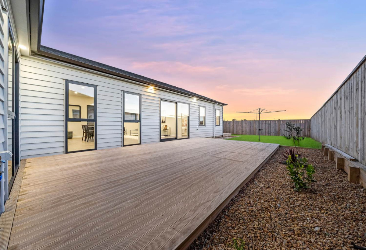 4 beds 3 baths house with double garage on 498m2 section, Set within the peaceful seaside community of Clarks Beach, enjoy weekends are filled with beach walks, golf days, boating adventures, and relaxed evenings spent with family and friends, 31 Korowhiti Road, Clarks Beach, Auckland