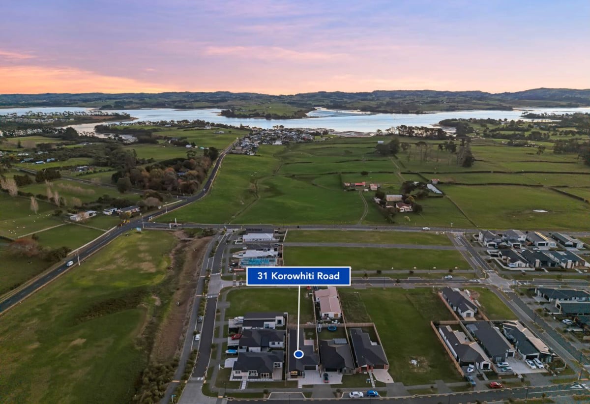 4 beds 3 baths house with double garage on 498m2 section, Set within the peaceful seaside community of Clarks Beach, enjoy weekends are filled with beach walks, golf days, boating adventures, and relaxed evenings spent with family and friends, 31 Korowhiti Road, Clarks Beach, Auckland