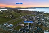 4 beds 3 baths house with double garage on 498m2 section, Set within the peaceful seaside community of Clarks Beach, enjoy weekends are filled with beach walks, golf days, boating adventures, and relaxed evenings spent with family and friends, 31 Korowhiti Road, Clarks Beach, Auckland