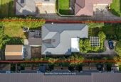 MORTGAGEE SALE, 4 beds 1 bath house on 890m2 section, the site is currently in the design stage for redevelopment, with concept plans reported to show redevelopment of the site to seven terraced houses, subject to council approval. The property backs onto Pomaria Primary School, and is well located close to the retail and commercial amenities at WestCity Waitakere and the Lincoln Road commercial precinct, 15 Kingdale Road, Henderson, Auckland