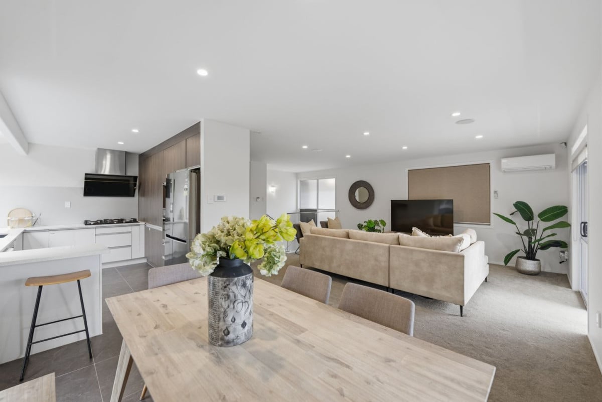 Home and Income, 7A Sailfish Drive, West Harbour, Auckland..160m2 4 beds 3 baths house with car parks on 468m2 section, Solid brick & cedar weatherboard cladding, Separate income area to help offset everyday living costs, close to schools, shops, motorway access & local amenities