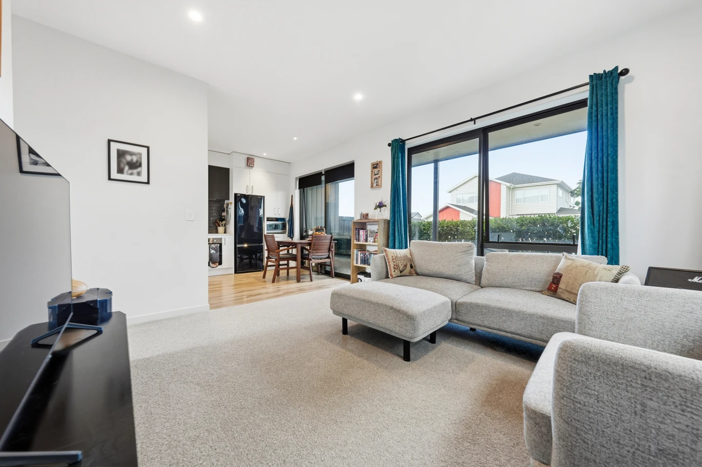 Built by Jalcon Homes, 2 beds 1 bath 1 car park apartment, Positioned on the ground level with its own private courtyard, just a short stroll to the heart of Kumeu, with easy access to Westgate Shopping Centre, SH16 motorway links, zoned for Huapai District School, St Paul’s School, and Massey High School, 3/38 Jane Maree Road Kumeu, Auckland
