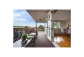 Home and income on 885m2 section, Main Home: Solid 1960s build with 3 bedrooms, 2 bathrooms, separate studio, and carport, Minor Dwelling: Built in 2019 (CCC issued) featuring 2 bedrooms, double glazing, chef’s kitchen, large entertaining deck, and off-street parking. Healthy Homes Certificate available. Less than 1km from major retail (New World, Whangaparaoa Shopping Centre, Hoyts). 628 Whangaparaoa Road Stanmore Bay, Auckland