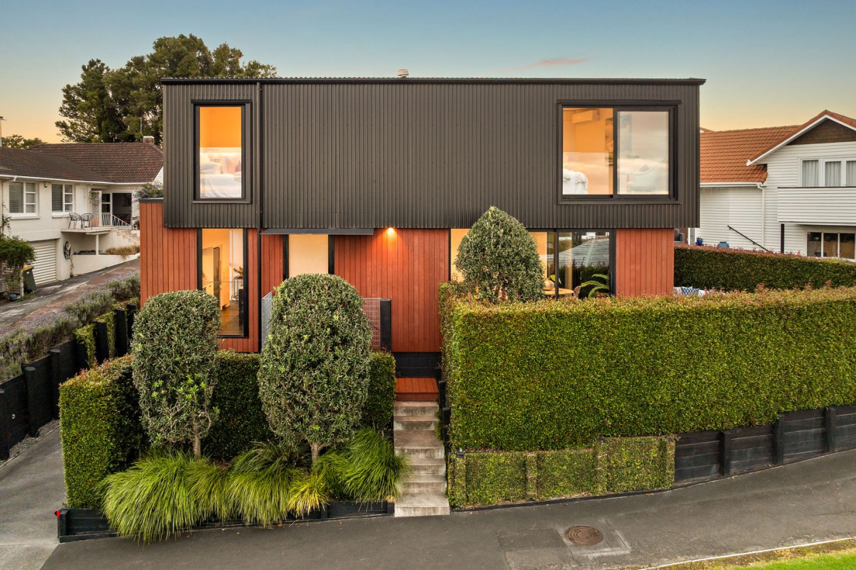 164m2 3 beds 2 baths home with double garage on 191m2 section, mature green fence lines frame the landscape, Both upstairs and downstairs bedrooms are thoughtfully positioned to embrace the water views, 118a Reihana Street, Orakei, Auckland