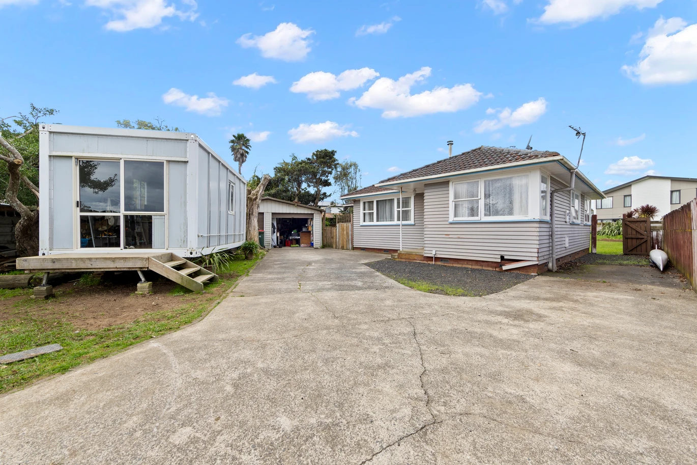 Once over 50 years, 713m2 section, 3 beds + Portable cabin included, 1 bath house with double garage, Handy Mangere location close to schools, shops, motorway access, and transport routes, 16 Lavinia Crescent Mangere East,, Auckland
