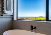 Uninterrupted sea views, 348m2 5 beds 5.5 baths house with double garage and 2-beds granny on 470m2 section, moments from Long Bay Beach and Long Bay Regional Park, shops, supermarket, schools, zoned for Long Bay College, Long Bay School, and Northcross Intermediate, 25 Kumukumu Road, Long Bay, Auckland