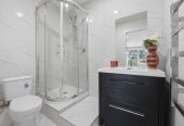 Home and Income, 7A Sailfish Drive, West Harbour, Auckland..160m2 4 beds 3 baths house with car parks on 468m2 section, Solid brick & cedar weatherboard cladding, Separate income area to help offset everyday living costs, close to schools, shops, motorway access & local amenities