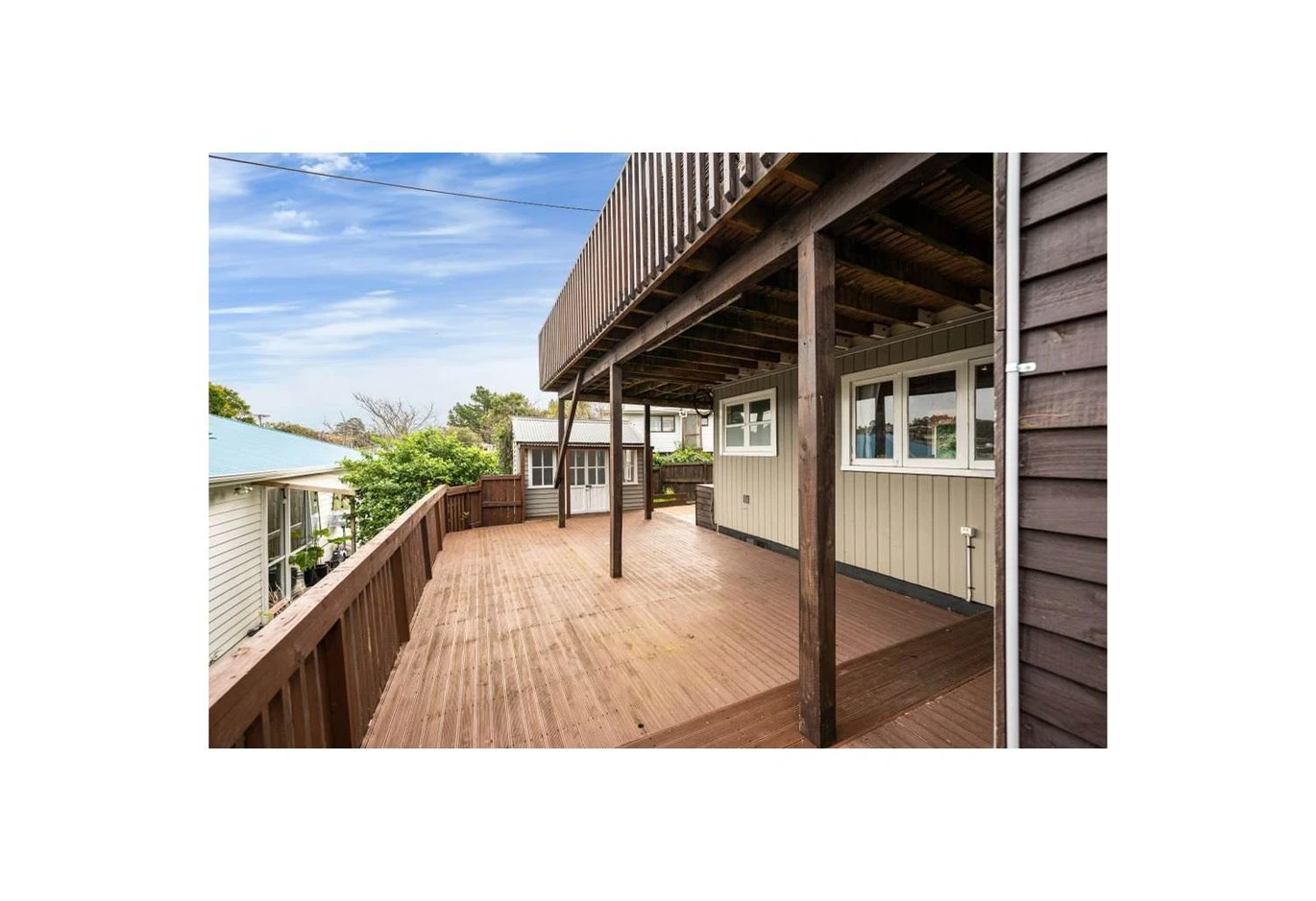 Home and income on 885m2 section, Main Home: Solid 1960s build with 3 bedrooms, 2 bathrooms, separate studio, and carport, Minor Dwelling: Built in 2019 (CCC issued) featuring 2 bedrooms, double glazing, chef’s kitchen, large entertaining deck, and off-street parking. Healthy Homes Certificate available. Less than 1km from major retail (New World, Whangaparaoa Shopping Centre, Hoyts). 628 Whangaparaoa Road Stanmore Bay, Auckland