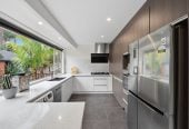 Home and Income, 7A Sailfish Drive, West Harbour, Auckland..160m2 4 beds 3 baths house with car parks on 468m2 section, Solid brick & cedar weatherboard cladding, Separate income area to help offset everyday living costs, close to schools, shops, motorway access & local amenities