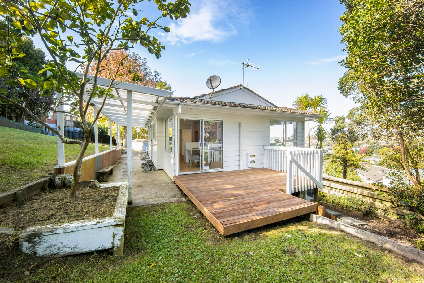 Renovated 3 beds 1 bath house on 1128m2 section, with a deck and pergola, a single garage and additional open parking spaces for up to five vehicles, 12 Glenbervie Crescent Massey,, Auckland