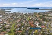 Home and Income, 7A Sailfish Drive, West Harbour, Auckland..160m2 4 beds 3 baths house with car parks on 468m2 section, Solid brick & cedar weatherboard cladding, Separate income area to help offset everyday living costs, close to schools, shops, motorway access & local amenities