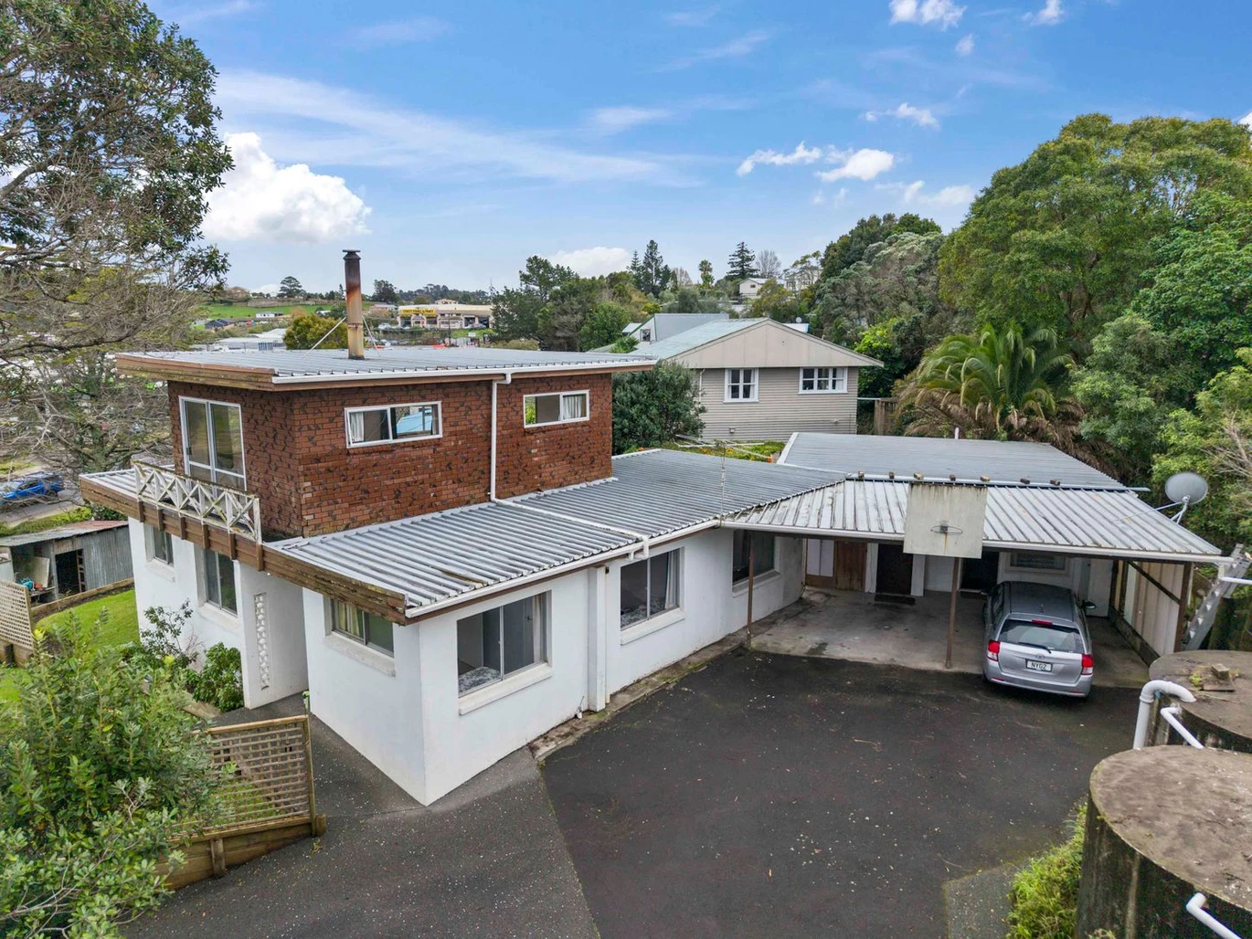 Home and Income on 827m2 section, 4 beds 2 baths house with 1- bed granny, within walking distance to Coast Plaza, public transport, schools, beaches, (this property can be purchased on its own OR in conjunction with neighboring 624, 626 & 628 Whangaparaoa Road), 630 Whangaparaoa Road, Stanmore Bay, Auckland