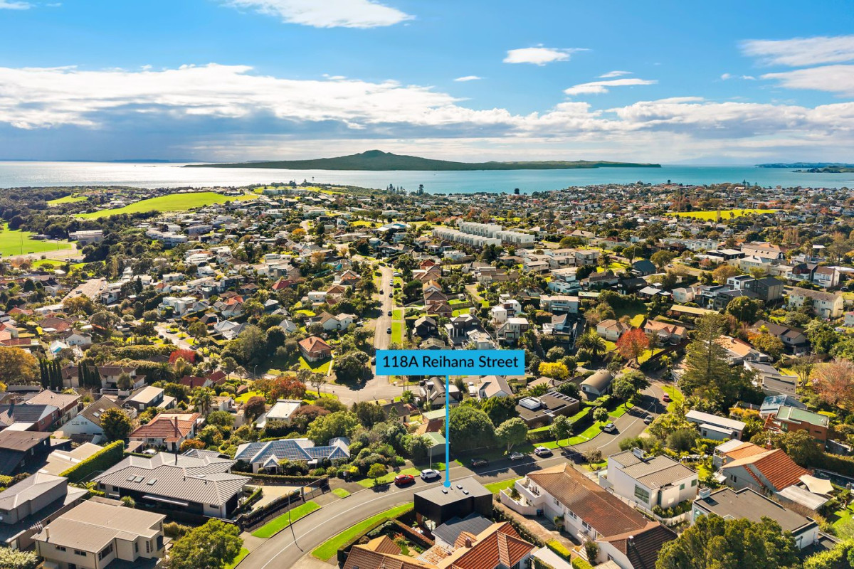 164m2 3 beds 2 baths home with double garage on 191m2 section, mature green fence lines frame the landscape, Both upstairs and downstairs bedrooms are thoughtfully positioned to embrace the water views, 118a Reihana Street, Orakei, Auckland