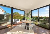 164m2 3 beds 2 baths home with double garage on 191m2 section, mature green fence lines frame the landscape, Both upstairs and downstairs bedrooms are thoughtfully positioned to embrace the water views, 118a Reihana Street, Orakei, Auckland