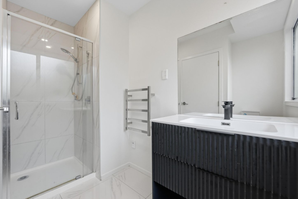 Home and Income, 7A Sailfish Drive, West Harbour, Auckland..160m2 4 beds 3 baths house with car parks on 468m2 section, Solid brick & cedar weatherboard cladding, Separate income area to help offset everyday living costs, close to schools, shops, motorway access & local amenities