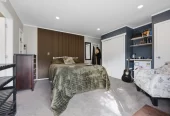 909m2 section, 158m2 4 beds 2 baths main houe PLUS a separate wing/sleepout with a 5th bedroom, bathroom, and covered deck, a massive covered patio with a professional-grade wood-fired pizza oven and a fully equipped outdoor bar area, a large carport, close to reserves, local shops, schools, 23 Tabitha Crescent Henderson, Auckland