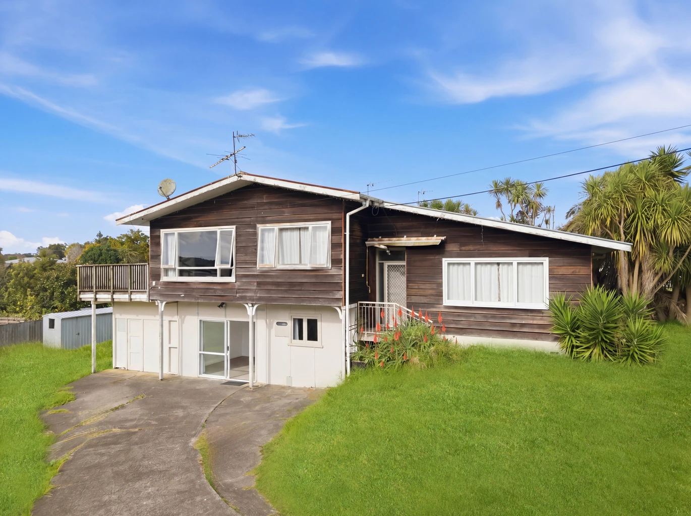 Home and income on 1184m2 section with approved RC for 4 Brick standalone homes, 3 beds + study room 1 bath main house with 2 rumpus rooms downstairs, The Minor Dwelling: A beautifully self-contained 1-bedroom home (complete with a living room, kitchen, and bathroom). currently rented for $449 per week, 148 Astley Avenue New Lynn, Auckland