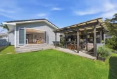 909m2 section, 158m2 4 beds 2 baths main houe PLUS a separate wing/sleepout with a 5th bedroom, bathroom, and covered deck, a massive covered patio with a professional-grade wood-fired pizza oven and a fully equipped outdoor bar area, a large carport, close to reserves, local shops, schools, 23 Tabitha Crescent Henderson, Auckland