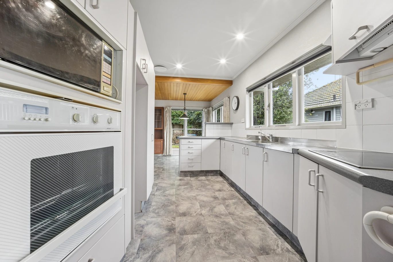 First time on the market, 825m2 section, 167m2 4 beds 1 bath house with carport and a large storage shed positioned at the rear of the section, close to motorway access, supermarket, shops, 67 Maioro Street New Windsor, Auckland