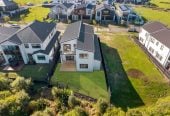 411m2 section backing onto reserve, 2 kitchens, 320m2 Brandnew 6 beds (4 ensuites) + study 5.5 baths house, double garage, 2 beds granny, 15 Seagreen Avenue, Karaka, Auckland