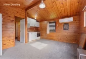 Home and income on 1184m2 section with approved RC for 4 Brick standalone homes, 3 beds + study room 1 bath main house with 2 rumpus rooms downstairs, The Minor Dwelling: A beautifully self-contained 1-bedroom home (complete with a living room, kitchen, and bathroom). currently rented for $449 per week, 148 Astley Avenue New Lynn, Auckland