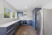 Home and income on 1184m2 section with approved RC for 4 Brick standalone homes, 3 beds + study room 1 bath main house with 2 rumpus rooms downstairs, The Minor Dwelling: A beautifully self-contained 1-bedroom home (complete with a living room, kitchen, and bathroom). currently rented for $449 per week, 148 Astley Avenue New Lynn, Auckland