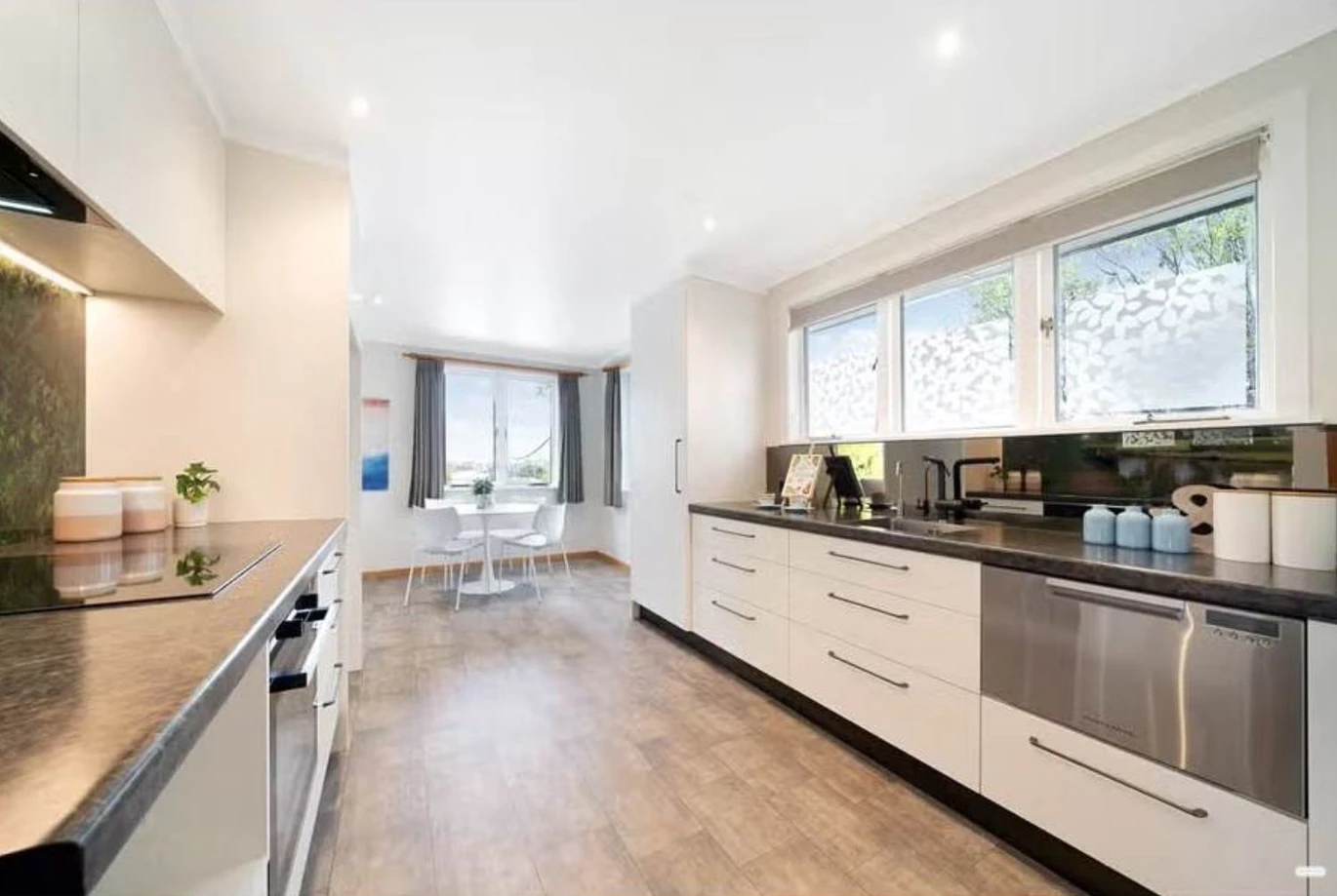 Urgent sale, Must sell, 812m2 section, 3 beds 1 bath house, A secure basement garage paired with ample under-house storage, A massive rear workshop featuring two rooms and three-phase power, 34 Coniston Avenue Te Atatu South, Auckland