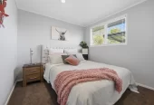 909m2 section, 158m2 4 beds 2 baths main houe PLUS a separate wing/sleepout with a 5th bedroom, bathroom, and covered deck, a massive covered patio with a professional-grade wood-fired pizza oven and a fully equipped outdoor bar area, a large carport, close to reserves, local shops, schools, 23 Tabitha Crescent Henderson, Auckland