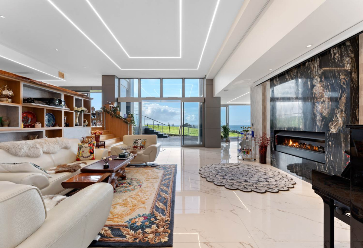 644m2 section, Sea Views, 4 beds (3 ensuites) + over-sized study room 4.5 baths house with double tandem garage (5.9m x 12.4m) for 4 cars, minutes to schools, Long Bay Village, beaches, 0.8 km to Long Bay College, 1.2 km to Long Bay School, 29 Bearing Parade, Long Bay, Auckland
