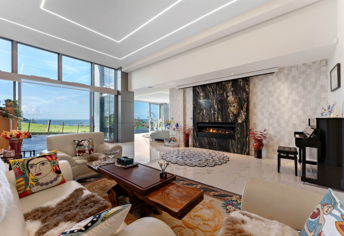 644m2 section, Sea Views, 4 beds (3 ensuites) + over-sized study room 4.5 baths house with double tandem garage (5.9m x 12.4m) for 4 cars, minutes to schools, Long Bay Village, beaches, 0.8 km to Long Bay College, 1.2 km to Long Bay School, 29 Bearing Parade, Long Bay, Auckland