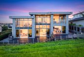 644m2 section, Sea Views, 4 beds (3 ensuites) + over-sized study room 4.5 baths house with double tandem garage (5.9m x 12.4m) for 4 cars, minutes to schools, Long Bay Village, beaches, 0.8 km to Long Bay College, 1.2 km to Long Bay School, 29 Bearing Parade, Long Bay, Auckland