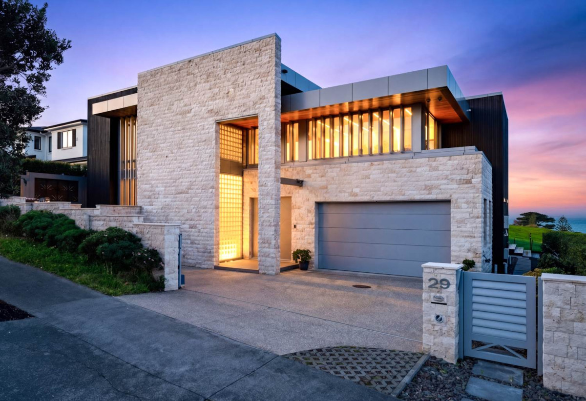 644m2 section, Sea Views, 4 beds (3 ensuites) + over-sized study room 4.5 baths house with double tandem garage (5.9m x 12.4m) for 4 cars, minutes to schools, Long Bay Village, beaches, 0.8 km to Long Bay College, 1.2 km to Long Bay School, 29 Bearing Parade, Long Bay, Auckland