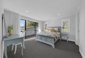 Macleans College zone, 791m2 section, 2 Kitchens, 411m2 Sea Views 6 beds (4 ensuites) 5.5 bathse house with double garaged and 2-beds granny, A striking façade, grand entrance, and elegant lobby make an immediate impression, close to schools, beaches, golf club, shops, 225A Bleakhouse Road, Mellons Bay, Auckland