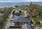 Macleans College zone, 791m2 section, 2 Kitchens, 411m2 Sea Views 6 beds (4 ensuites) 5.5 bathse house with double garaged and 2-beds granny, A striking façade, grand entrance, and elegant lobby make an immediate impression, close to schools, beaches, golf club, shops, 225A Bleakhouse Road, Mellons Bay, Auckland