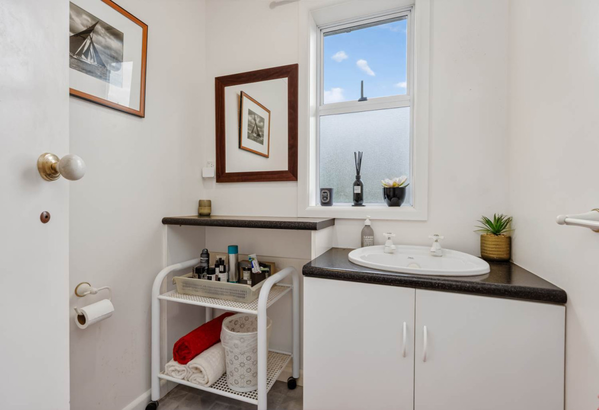 1012m2 section, Home and Income, Westlake Boys and Girls school zone, main house 3 beds 2 baths house with double garage, Standalone minor dwelling 1 bed 1 bath, minutes from schools, Milford Beach, Milford Village, North Shore Hospital, 0.2 km to Milford School (Auckland), 11 Otakau Road, Milford, Auckland