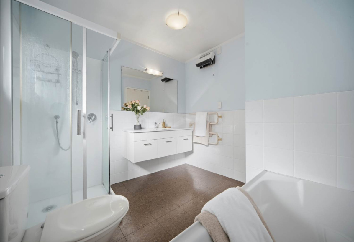 Brick and tile 3 beds 1 bath house with garage and expansive, fully fenced backyard, close to schools, shops, supermarket, beaches, 0.5 km to Sherwood School (Auckland), 0.9 km to Northcross Intermediate, 2/7 Newstead Avenue, Browns Bay, Auckland