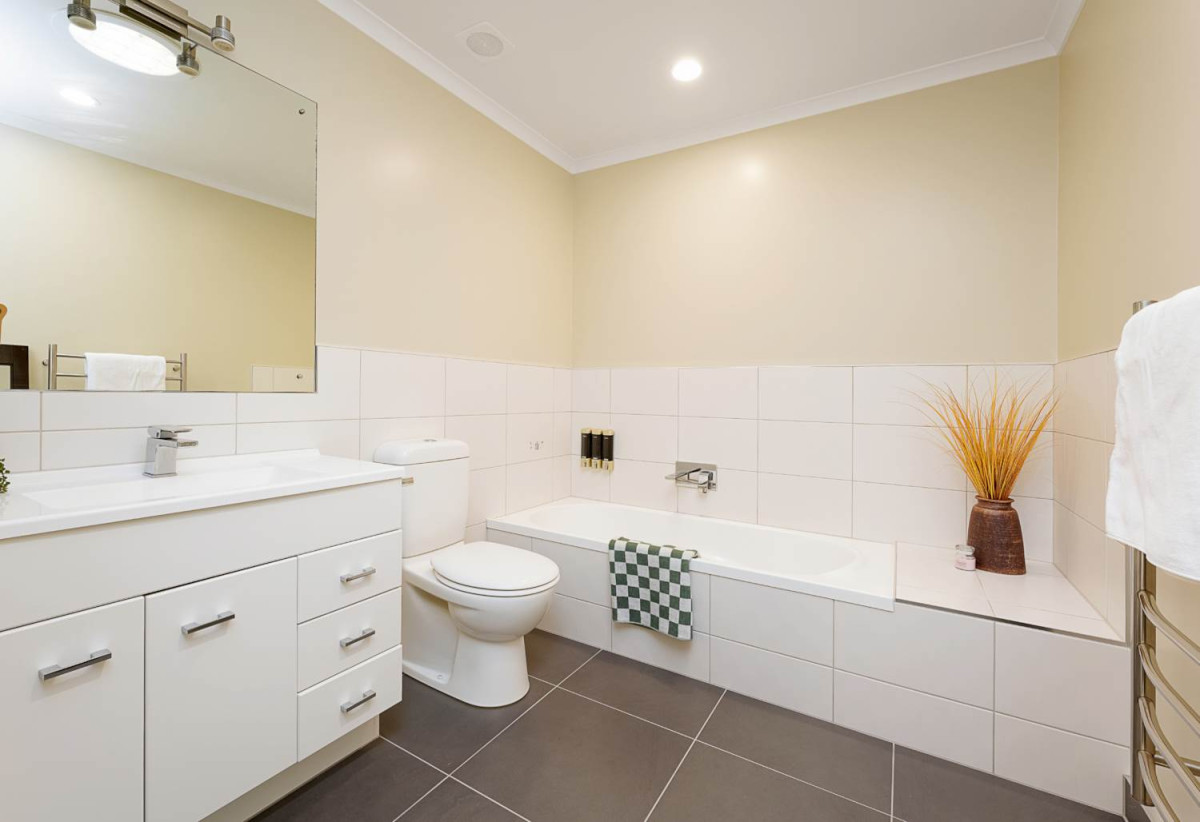 Home and income on 2502m2 section, 2 kitchens, main house 3 beds 2 baths with double garage, a private guest wing 2 beds 1 bath with its own entrance and single garage, overlooking the picturesque Torbay Heights Reserve, Approximately 10 minutes to Albany Mega Centre, close to schools, beach, 1.2 km to Long Bay School, 1.5 km to Long Bay College, 2 km to Northcross Intermediate, 349 Glenvar Road, Long Bay, Auckland