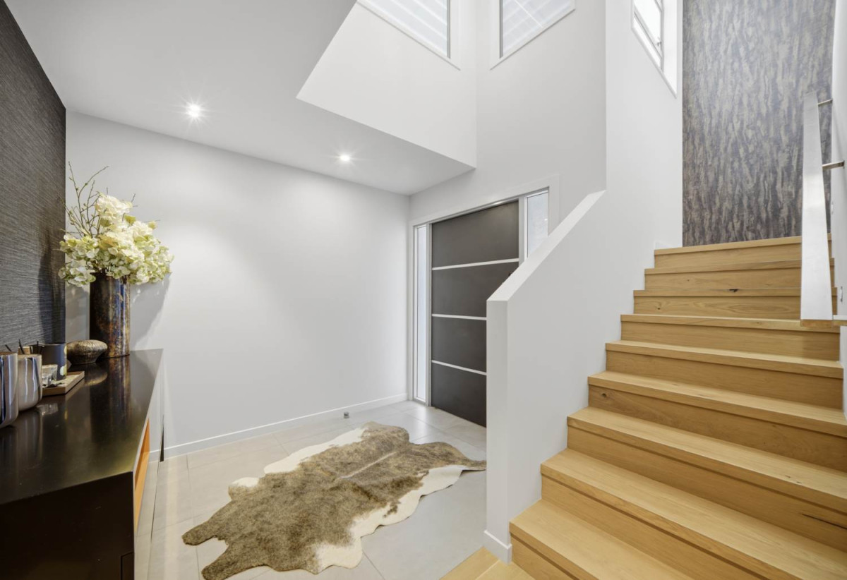 Double Westlake school zone, Breathtaking 180° Views, Sea Views, city skyline views, 640m2 section, 4 beds (2 ensuites) + large office room and rumpus room 3.5 baths house with double garage, 2024 luxury renovated, close to beach, Milford shops, schools, Zoned for Campbells Bay School, Westlake Boys’ and Westlake Girls’ High Schools, and Murrays Bay Intermediate, 62 Seaview Road, Castor Bay, Auckland