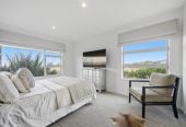 Double Westlake school zone, Breathtaking 180° Views, Sea Views, city skyline views, 640m2 section, 4 beds (2 ensuites) + large office room and rumpus room 3.5 baths house with double garage, 2024 luxury renovated, close to beach, Milford shops, schools, Zoned for Campbells Bay School, Westlake Boys’ and Westlake Girls’ High Schools, and Murrays Bay Intermediate, 62 Seaview Road, Castor Bay, Auckland