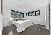 Next to a reserve, 5 beds (3 ensuites) 4 baths house with garage, The lower level features 2 bedrooms, 1 bathroom and a separate entrance, close to schools, Wairau Park Shopping Centre, 0.6 km to Target Road School, 17B Cheval Drive, Totara Vale, Auckland