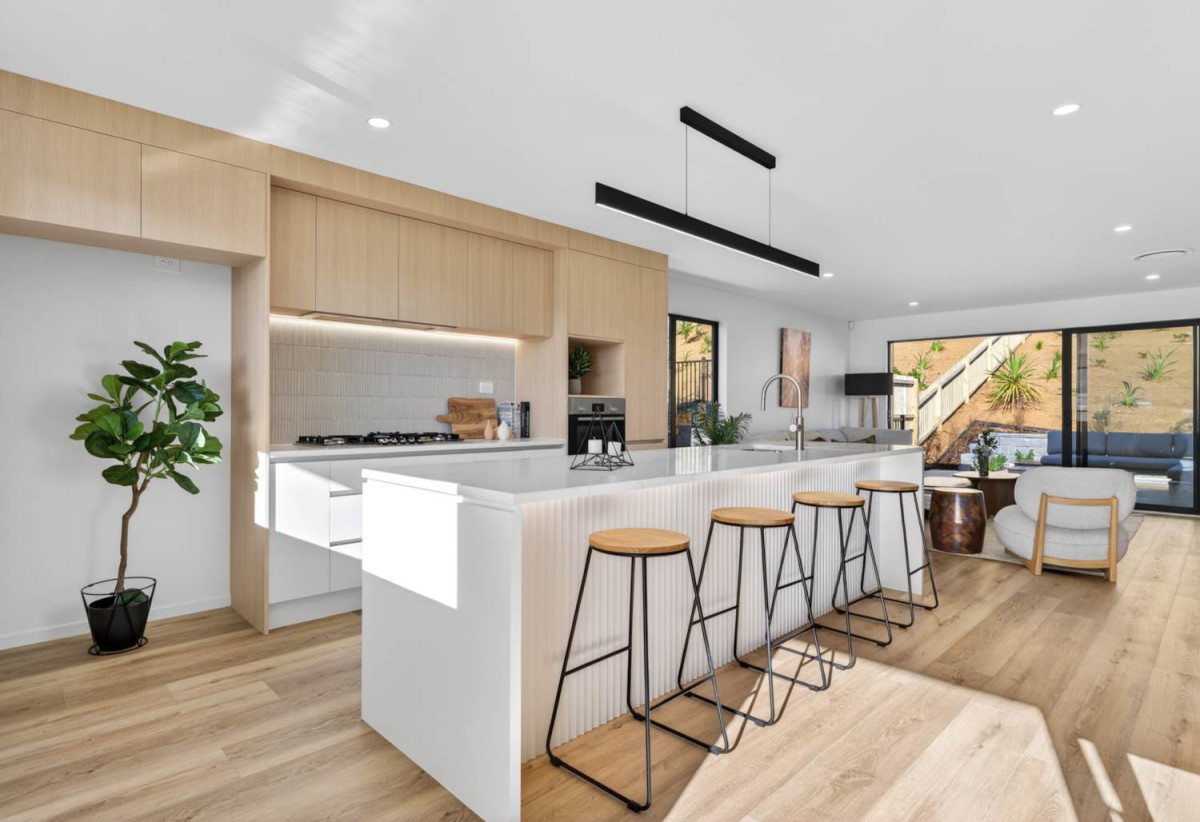 587m2 section, 227m2 Brandnew standalone 5 beds (1 ensuite) 3 baths house with double garage and big backyard, 3 beds 1 bath ground floor, move-in ready, close to schools, shops, beach, motorway access, 0.5 km to Nukumea School, 2 km to Orewa College, 242E West Hoe Heights, Orewa, Auckland
