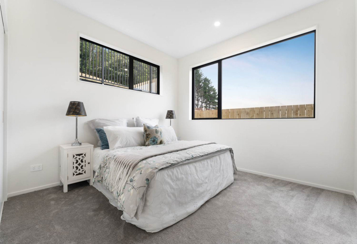587m2 section, 227m2 Brandnew standalone 5 beds (1 ensuite) 3 baths house with double garage and big backyard, 3 beds 1 bath ground floor, move-in ready, close to schools, shops, beach, motorway access, 0.5 km to Nukumea School, 2 km to Orewa College, 242E West Hoe Heights, Orewa, Auckland