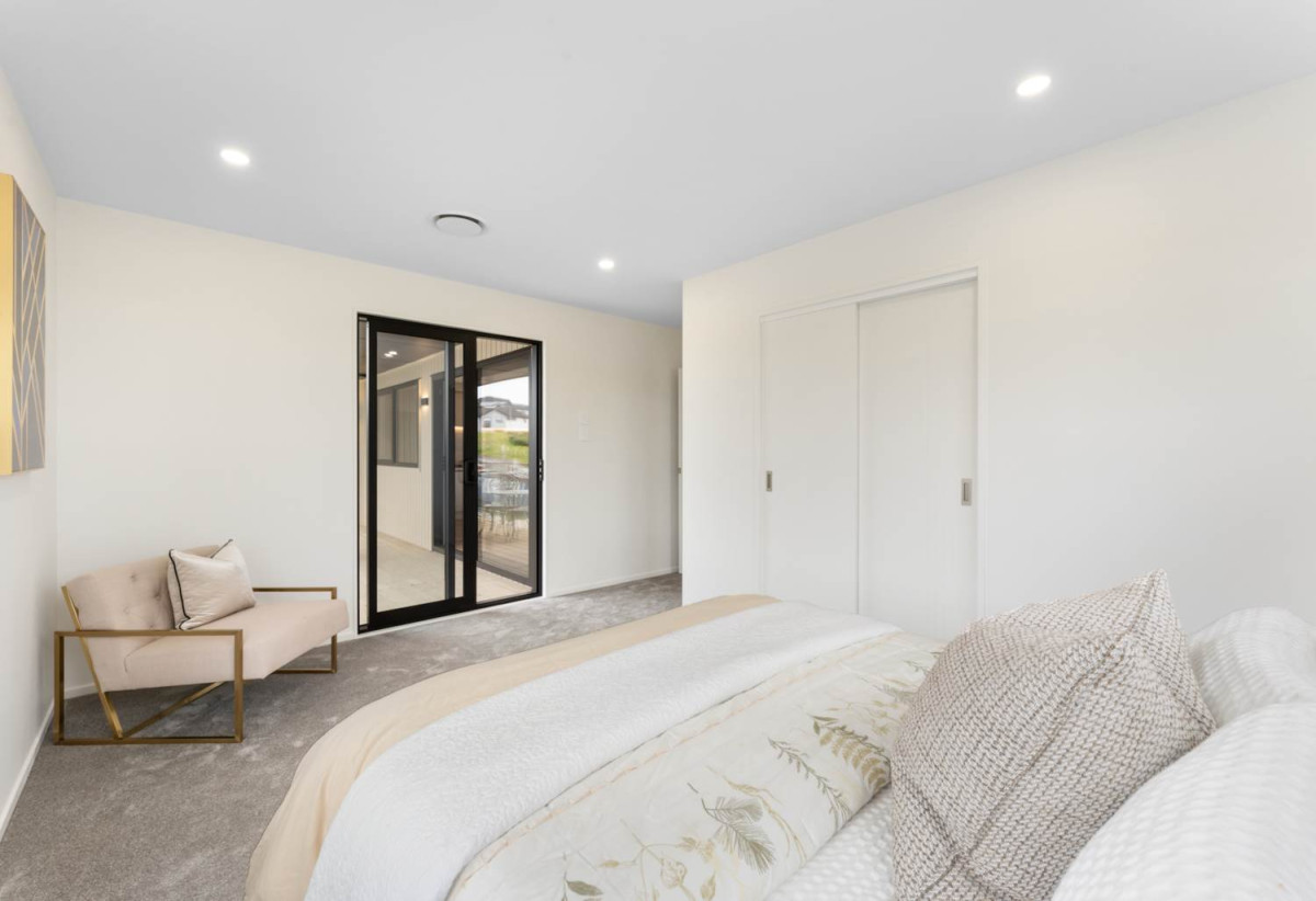 587m2 section, 227m2 Brandnew standalone 5 beds (1 ensuite) 3 baths house with double garage and big backyard, 3 beds 1 bath ground floor, move-in ready, close to schools, shops, beach, motorway access, 0.5 km to Nukumea School, 2 km to Orewa College, 242E West Hoe Heights, Orewa, Auckland